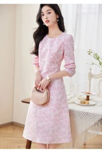 Two tone jacquard waist cinched long sleeved dress